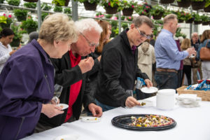 People Eating Samples At Fogler's Greenhouse & Farm Market Open House 2019.